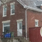 Who is looking after the baby boy left on a London doorstep?